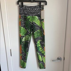 Goldsheep Black Leggings with Green Tropical Leaf Print and Orange Accents